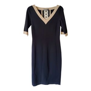D. Exterior fitted black dress with‎ cut out detail